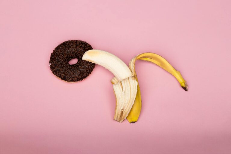 yellow banana fruit on pink background